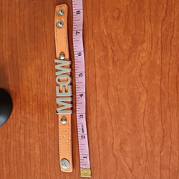 BCBG "MEOW" on Orange Leathery Bracelet - Picture 2 of 8